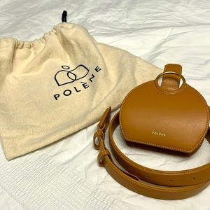 This brand new waist bag from Polène is beautiful. Comes with attachable band❤️